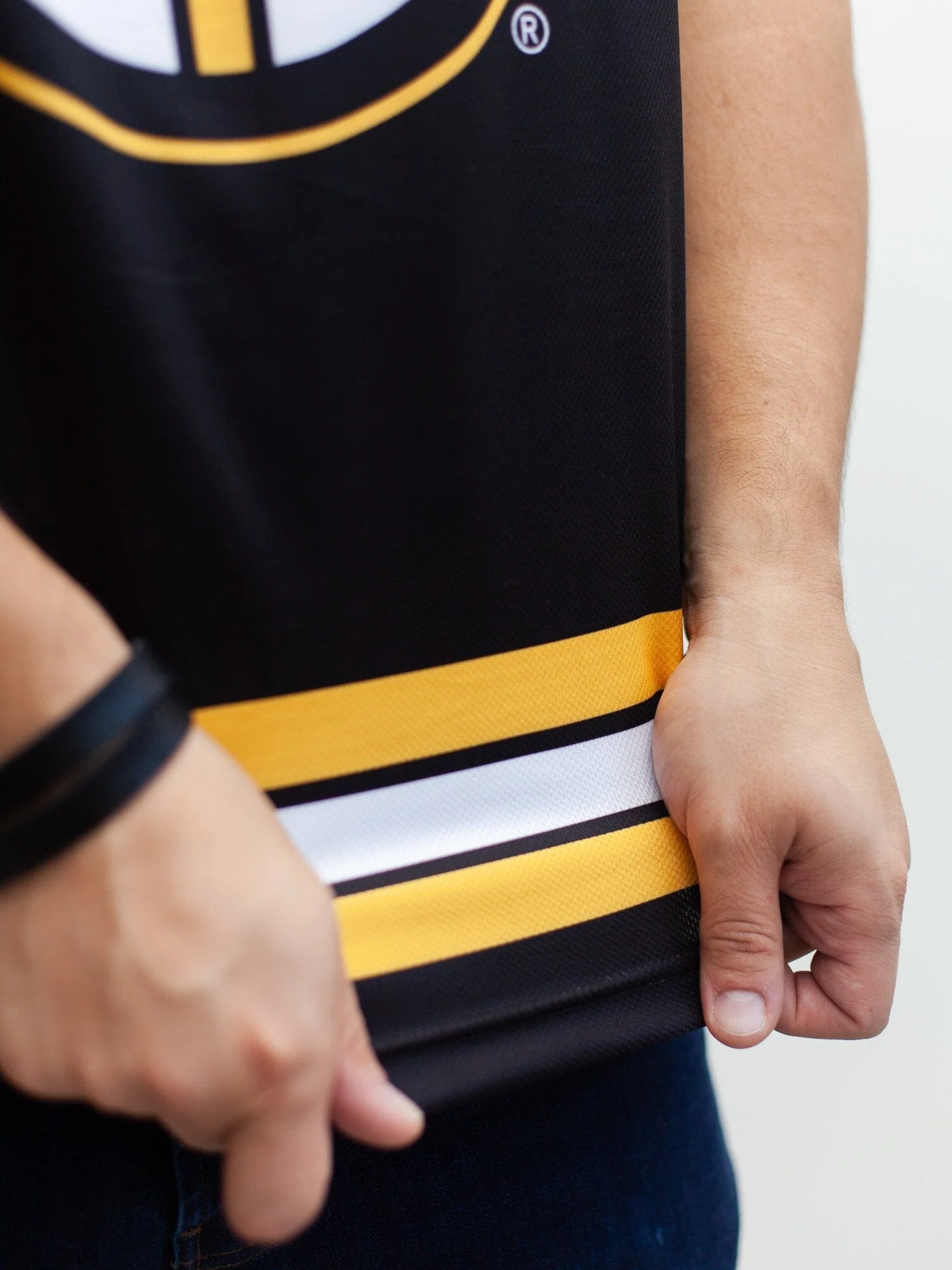 Boston_Bruins_Home_Hockey_Tank_-_Material_Close-up_78c86de0-2032-46bf-88c4-8d73cb4ca469.webp