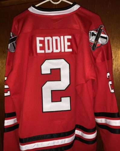 Click to view full screen Cousin Eddie #2 Chicago Shitters Christmas Vacation Style Hockey Jersey photo review